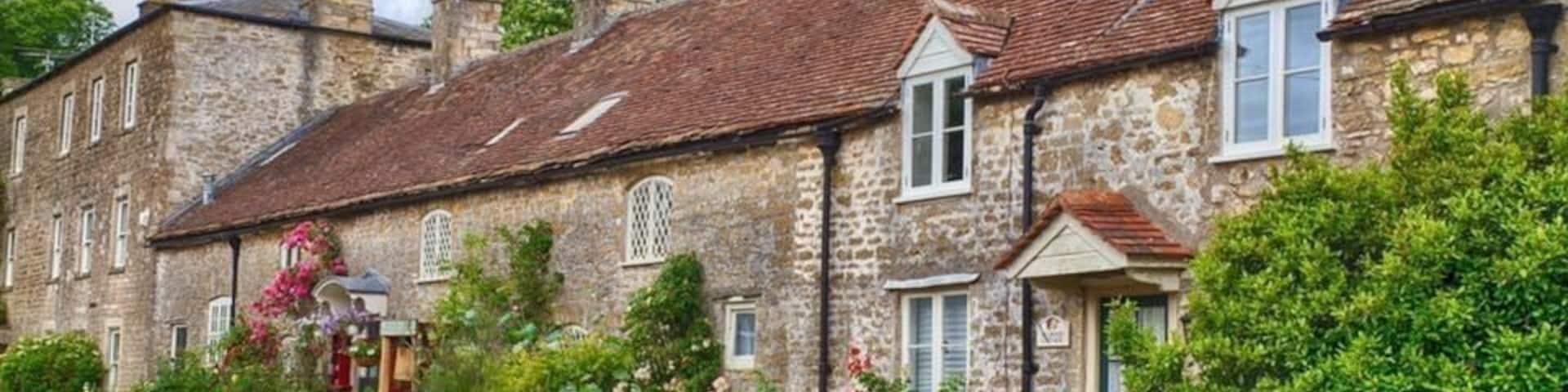 Row of houses in Mells.
Mells is a village and civil parish in Somerset, England, near the town of Frome.