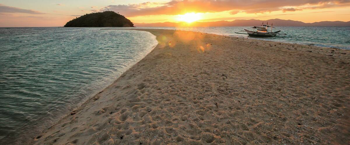 Bonbon Beach in Romblon Island is gaining recognition thanks to social media. With its picturesque sandbar and clear waters, it's the perfect place to take a dip or watch the sunset.