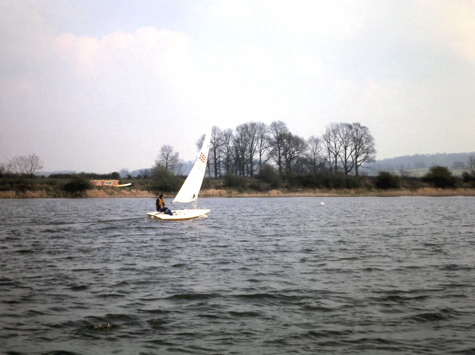 Napton reservoir View east across Napton reservoir when it used to be home to AP Sailing Club. A narrowboat can be seen in the background on the Grand Union Canal, having just left Calcutt Locks heading for Napton Junction and the Oxford Canal.