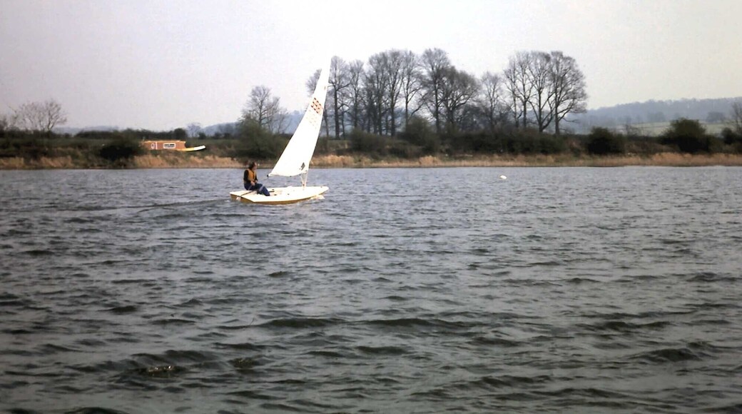 Napton reservoir View east across Napton reservoir when it used to be home to AP Sailing Club. A narrowboat can be seen in the background on the Grand Union Canal, having just left Calcutt Locks heading for Napton Junction and the Oxford Canal.