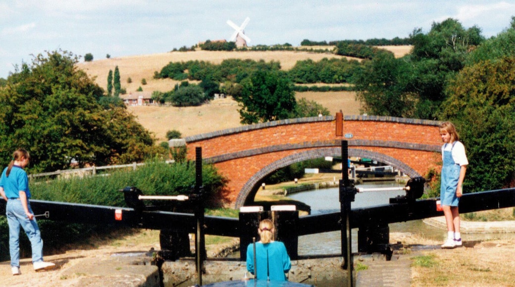 Gilkes Bridge Oxford canal Napton View from the 3rd lock up Napton flight back to the bottom lock with Napton windmill on the hill top in the background.