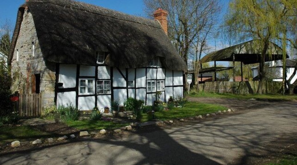 Thatched cottage in Dorsington Half-timbered thatched cottage near the church in Dorsington.