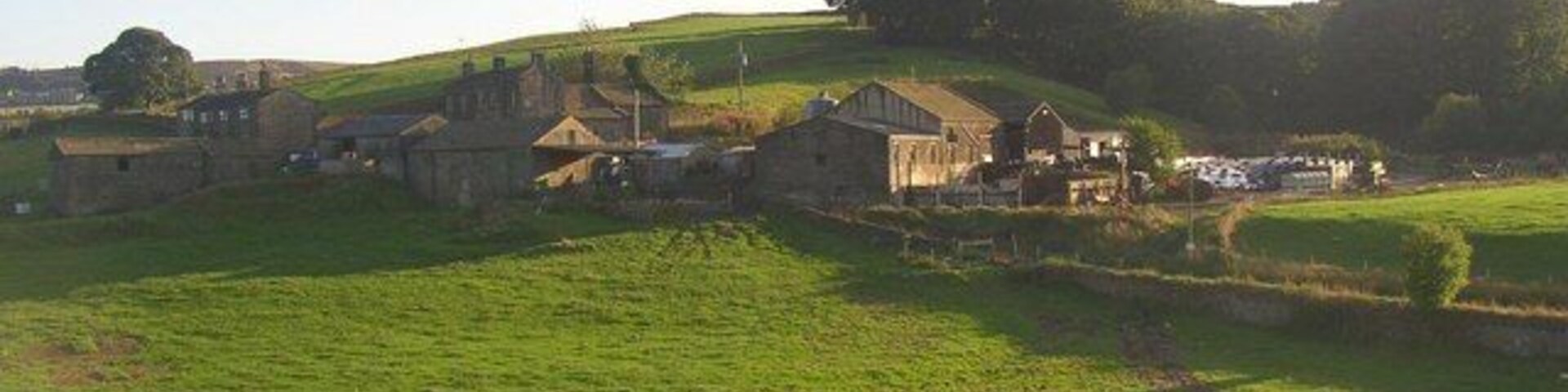 East Manywells Farm, Cullingworth. This is quite a hamlet, yet access is by a private road (Doll Lane, a public footpath). Seen here from the Great Northern Trail.