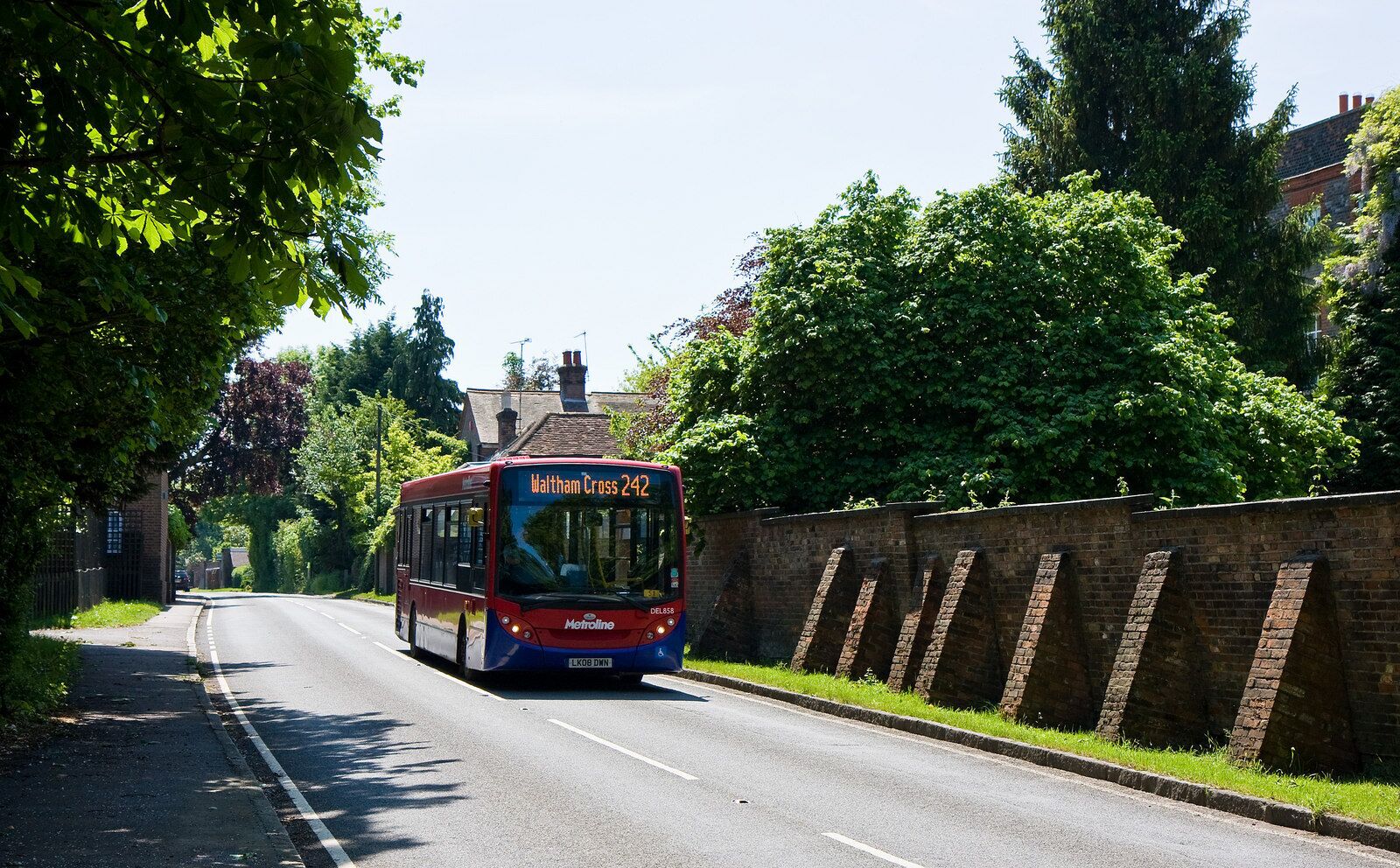 Coopers Lane, Data from Geograph: Description: A 242 bus passes a large house on the B156 Coopers Lane, on route to Waltham Cross from Potters Bar. The wall on the right has started to lean badly sometime in the past and buttresses have been provided to prevent collapse.... more ICBM: 51.704334176902, -0.1620680388971 Location: (about 1 km from) near to Northaw, Hertfordshire, Great Britain.