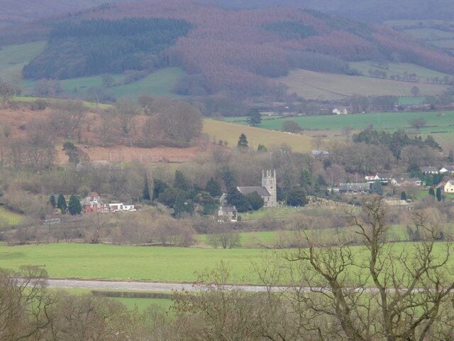 St Peter's Church, Glasbury-on-Wye from Cwmbach Looking across the Wye Valley from a footpath above Cwmbach. Shows the River Wye, the River Llynfi beyond it, St Peter's Church and the Common.