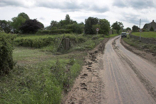 Flash flood aftermath A flash flood on 19th of June 2005 turned the road East of Fadmoor into a raging torrent.