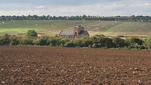 Old station, South Luffenham. The old station yard houses several small industrial units now. The railway is the mainline from Leicester to Stansted Airport, passing through Melton Mowbray and Oakham before reaching this point. (I've picked Disused station as the category as it isn't used by the railway anymore.)