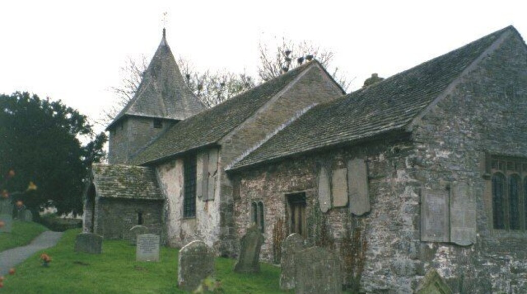Llanfilo Church. This church, dedicated to St Bilo or St Milburg (Abbess of Wenlock in the 7C), has Norman masonry but has been altered and extended over the centuries. Its main feature is the 16C screen and rood loft, restored between 1913 and 1951.