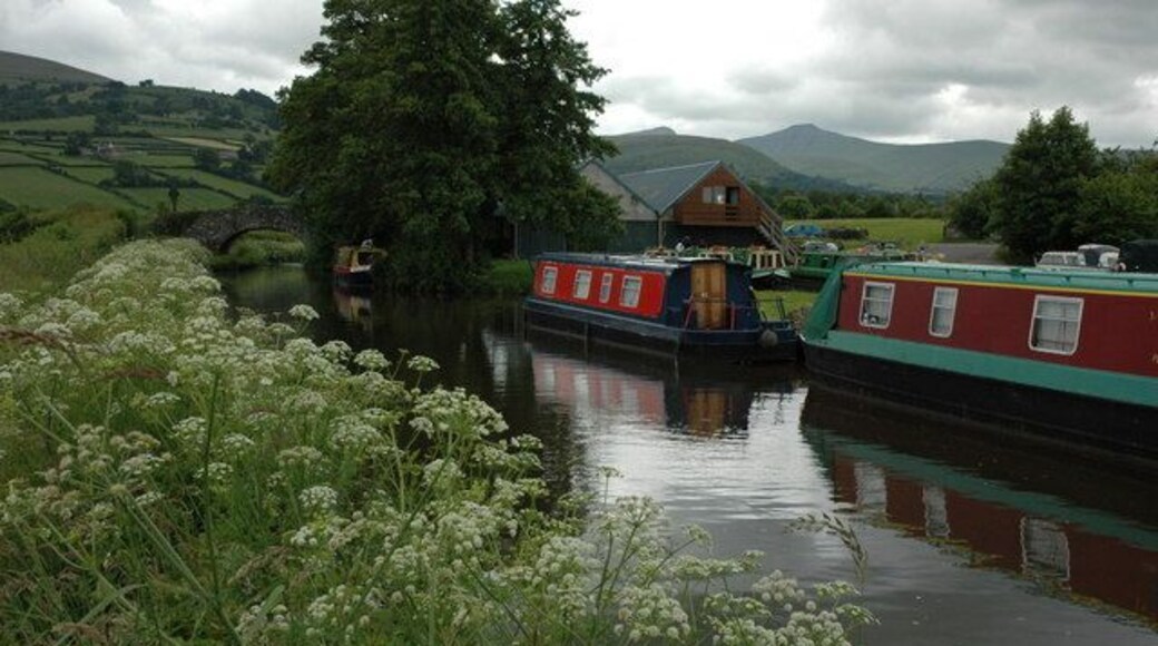 Narrow boats on the Monmouthshire and Brecon Canal Narrow boats moored on the Monmouthshire and Brecon Canal at a marine near Llanfrynach. The Brecon Beacons are on the horizon.