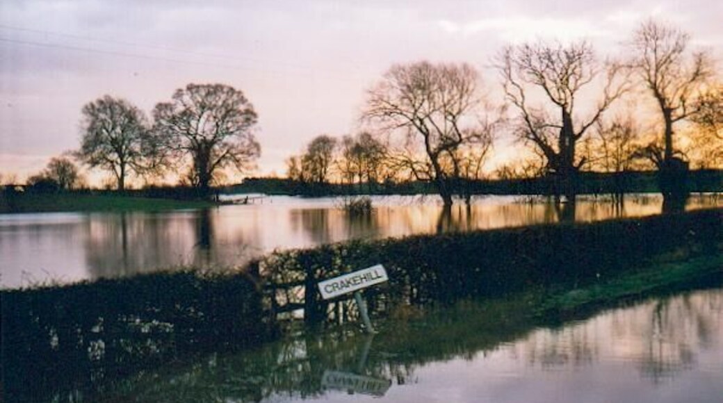 River Swale in flood Crakehill. Floods back up a tributary stream to cut the road leading to the hamlet of Crakehill near Thirsk.