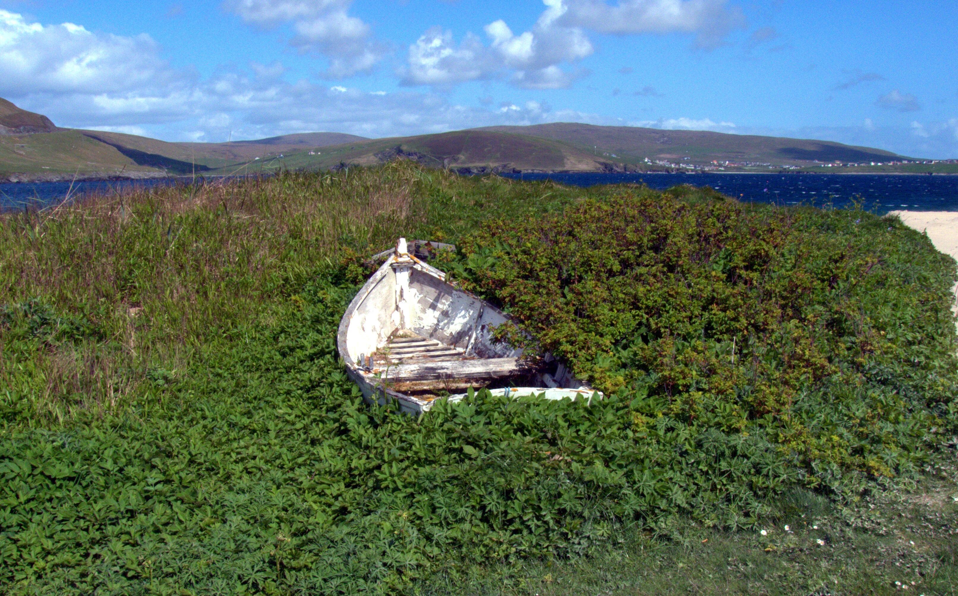 Abandoned boat next to Levenwick beach.