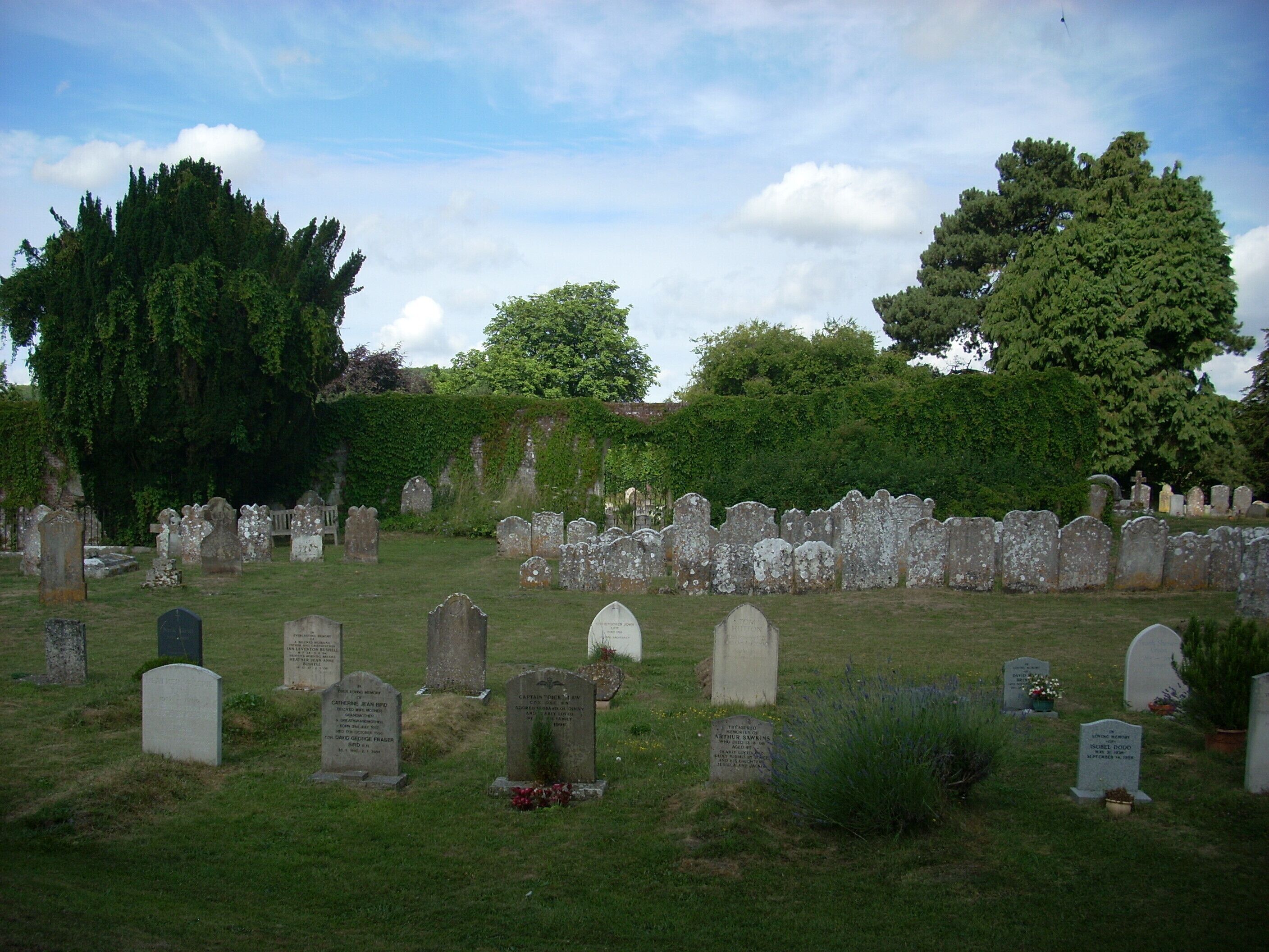 The churchyard of the church of St Mary and St Gabriel, South Harting, West Sussex, England.