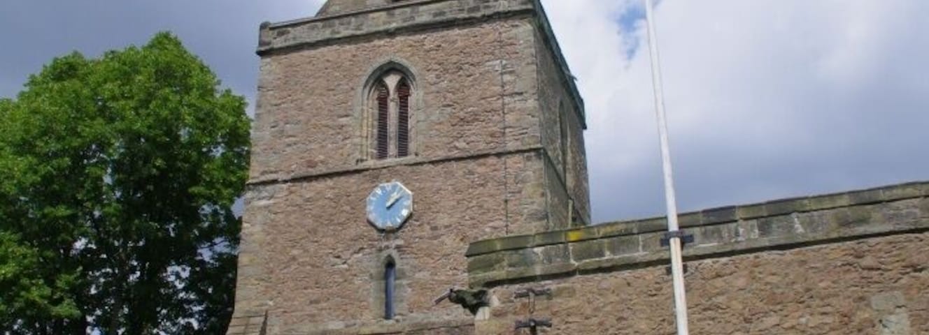West tower, spire and 20th-century Gothic Revival porch of St Andrew's parish church, Aylestone, Leicester