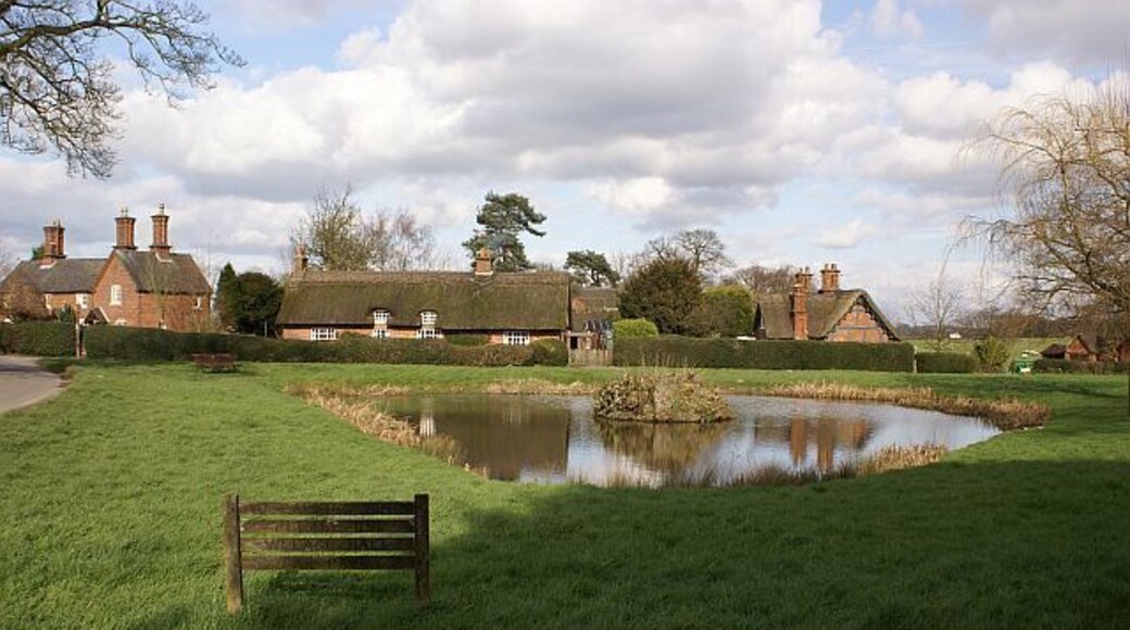 Osmaston village pond Looking across Osmaston village pond towards some thatched cottages.