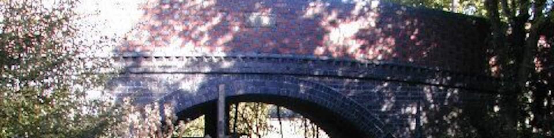 Disused Shropshire Union Canal - Shrewsbury Branch. This bridge is over a tiny piece of canal - much has been filled in and lost. The bridge itself is for the A442 road which has now been bypassed.