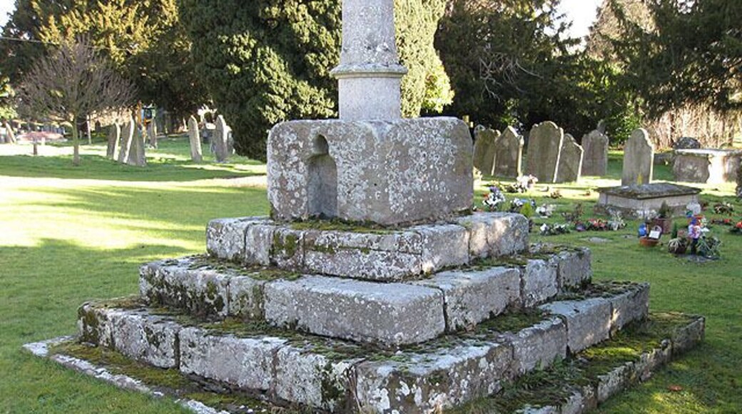 14th century base and steps of stone cross in the parish churchyard of St Mary the Virgin, Burghill, Shroilshire. The shaft and head are 19th-century. See 1131310