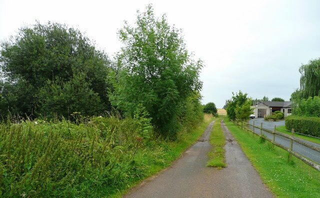Parallel roads View south of Gosmore Road, Clehonger, showing the public footpath, left, and private drive, right.