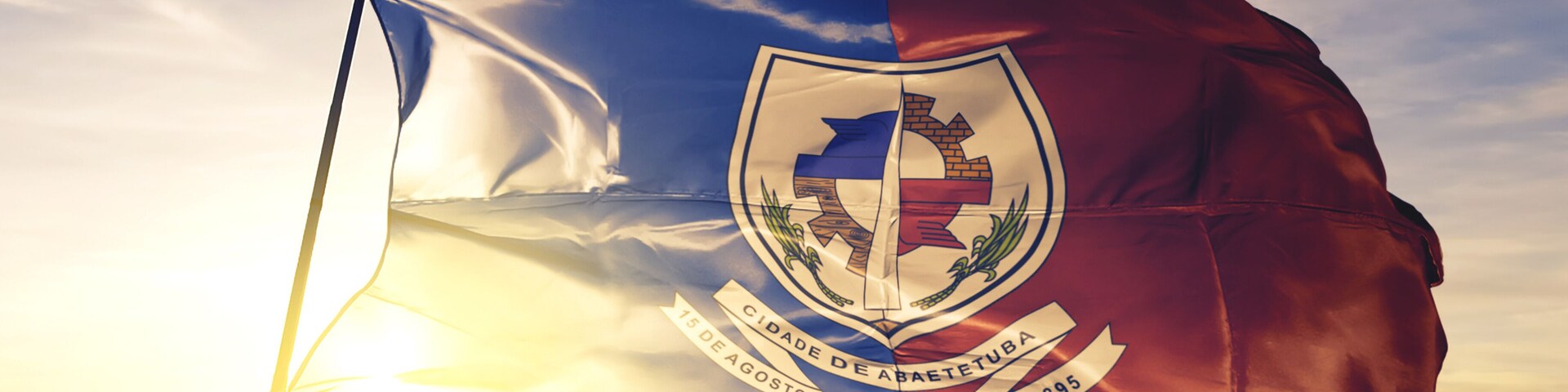 Abaetetuba of Brazil flag waving on the top sunrise mist fog