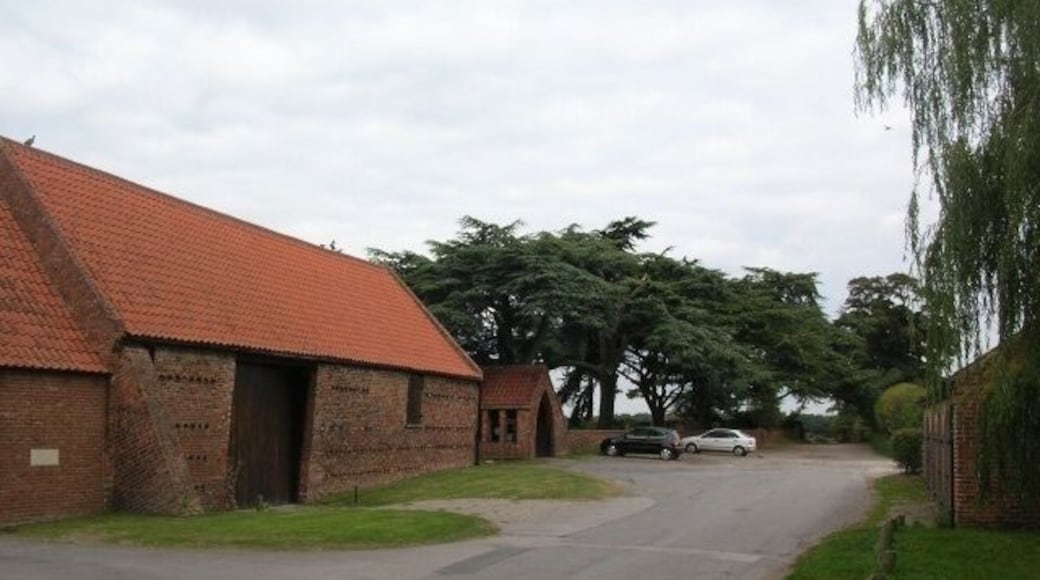 Farm in Nether Poppleton The nearest building is a farm, and just beyond that is the entrance to the church.