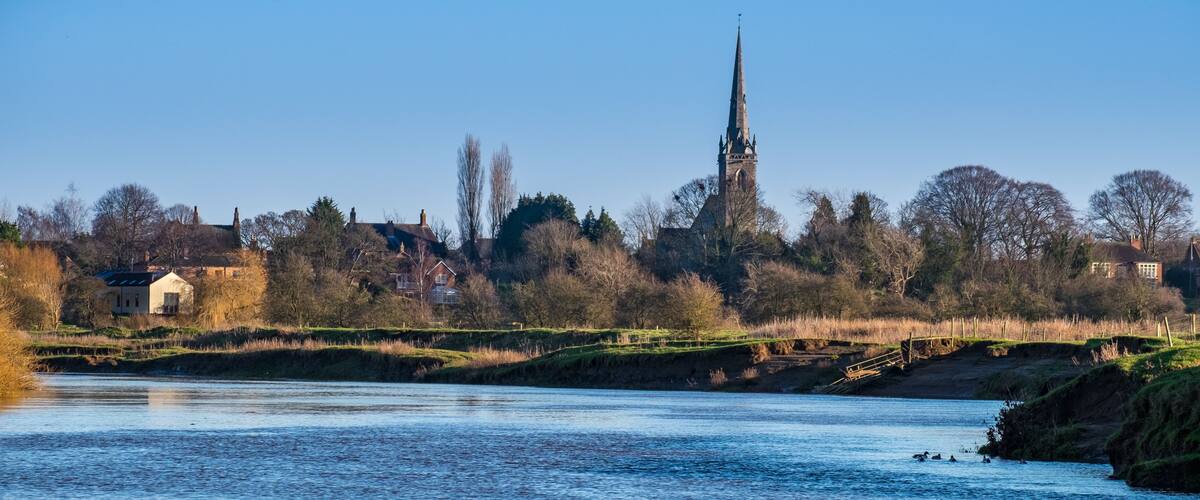 All Saints Church Newton-on-Ouse from the River Ouse - North Yorkshire UK