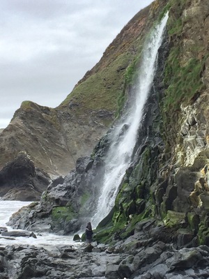A stroll along the beach led to a clamber across the rocks which led to stumbling into this gorgeous waterfall running into the sea!