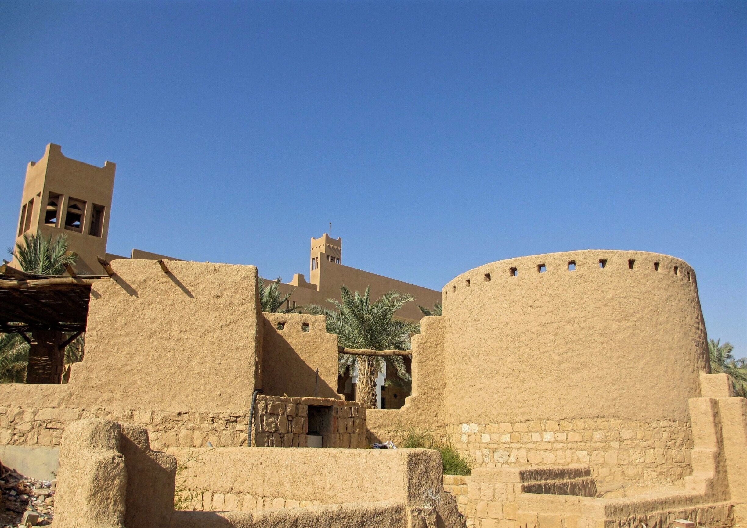 Diriyah is a very old historic settlement located on the outskirts of Riyadh.  

This site contains the ruins of the old city of Al-Diri'ya which has been/is being renovated and restored,  

Wadi Hanifa also goes through this site and is probably the best public park in Riyadh.  Although I might argue that the Diplomatic Quarter is better for walking if you are a woman who prefers hikes without an abaya.

#blue