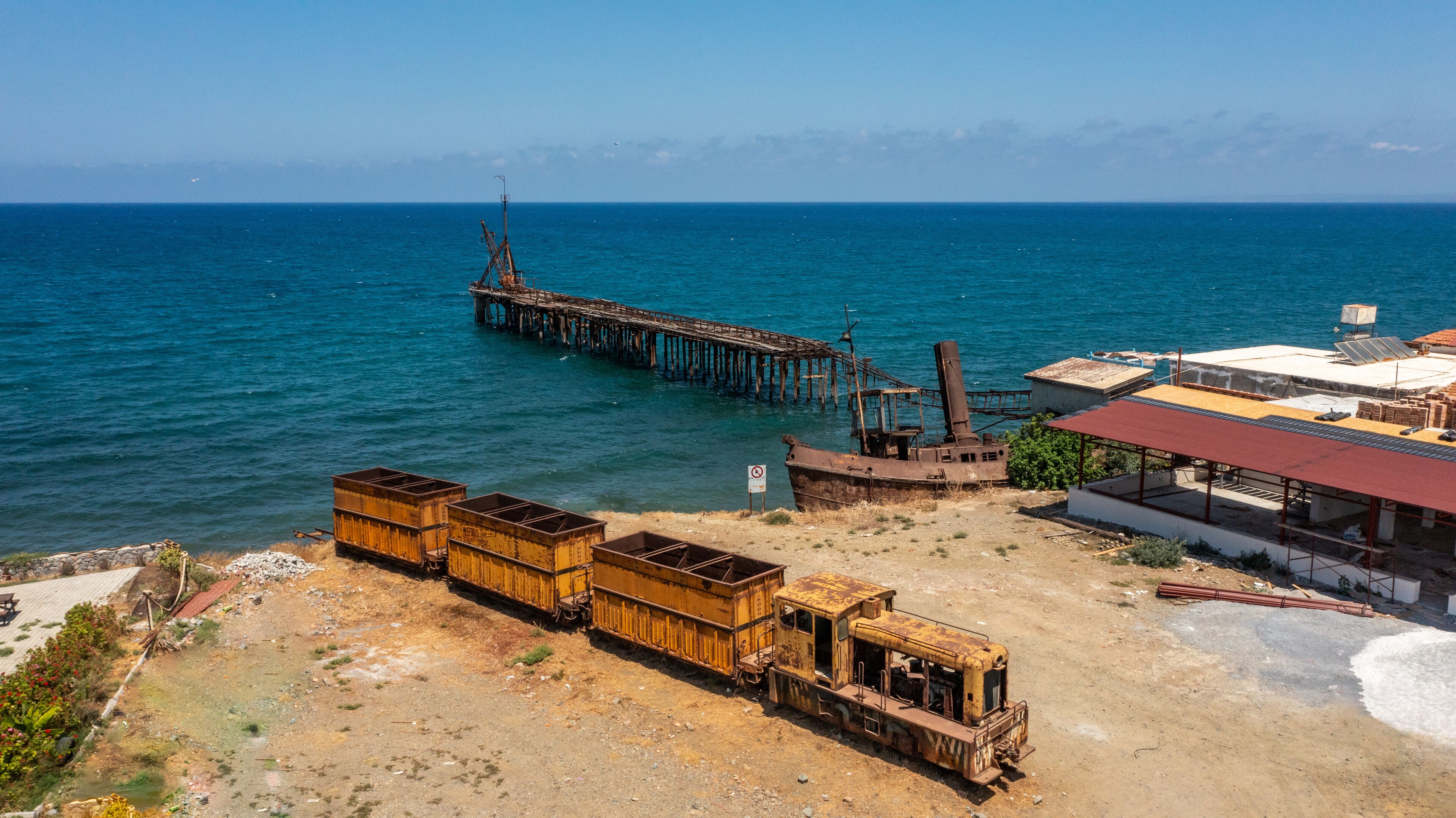 North Cyprus - Lefke - Karavostasi Shipwreck is an amazing abandoned place with and old train, ship and an pier from drone view