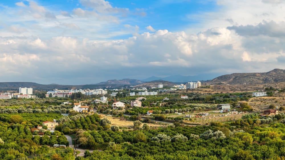 Lefka town panorama with modern buildings and green residential suburbs, Northern Cyprus
