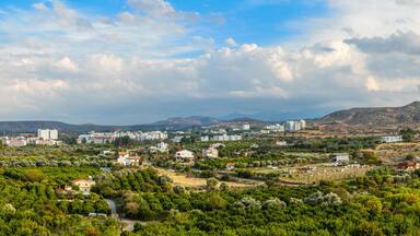 Lefka town panorama with modern buildings and green residential suburbs, Northern Cyprus