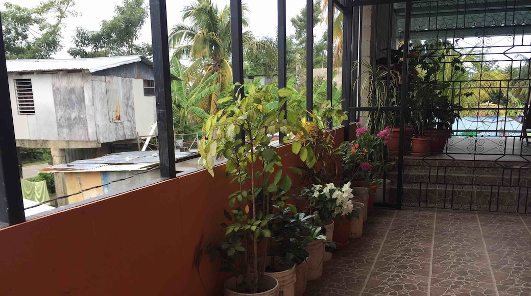 The lucky lady’s neighbor...beautiful patio of a nice house next to a more common dwelling