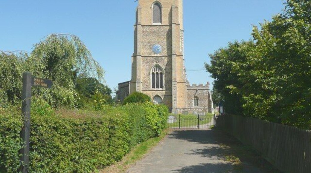 Entrance to churchyard, Church Lane, Ridgewell From the end of Church Lane this broad path leads into the churchyard. It is also a public footpath, and the lettering on the sign has been coloured gold.