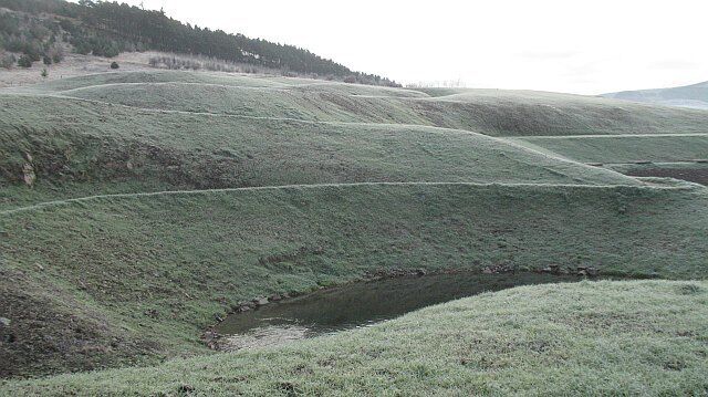 Landscaped ground, Glentress Now turfed, the sculpted ground that will surround the visitor facilities at Glentress.