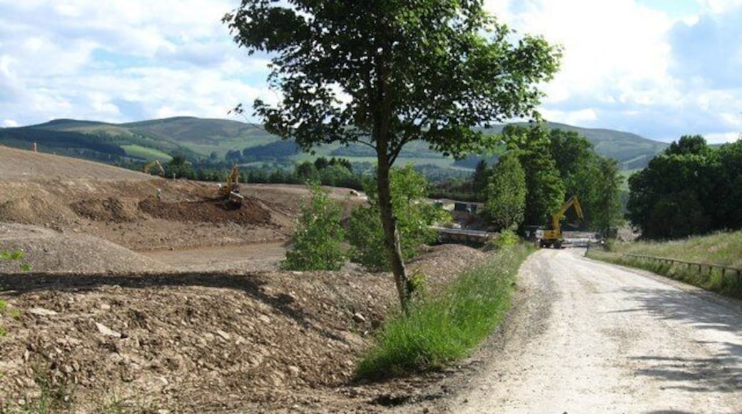 The road leaving the Glentress Forest behind The road near the exit to Glentress Forest goes through much activity as new roads and paths are being constructed at the foot of the hills near Eshiels.