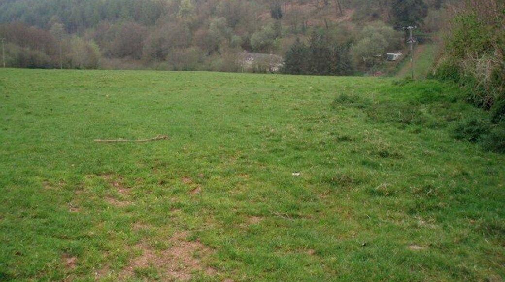 View across the Valley. Taken on a drizzly spring day, the solitary house in the bottom of the valley is on the lane to Chargot House.