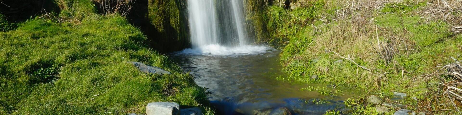 On the beach there is a waterfall, which can only be seen after heavy rain fall. There is a great walk through some woods from the main car park by the church to get to this amazing crescent shape cove where you will find this waterfall. A pebble beach offers a great swimming area and a quite place to take some great pictures.