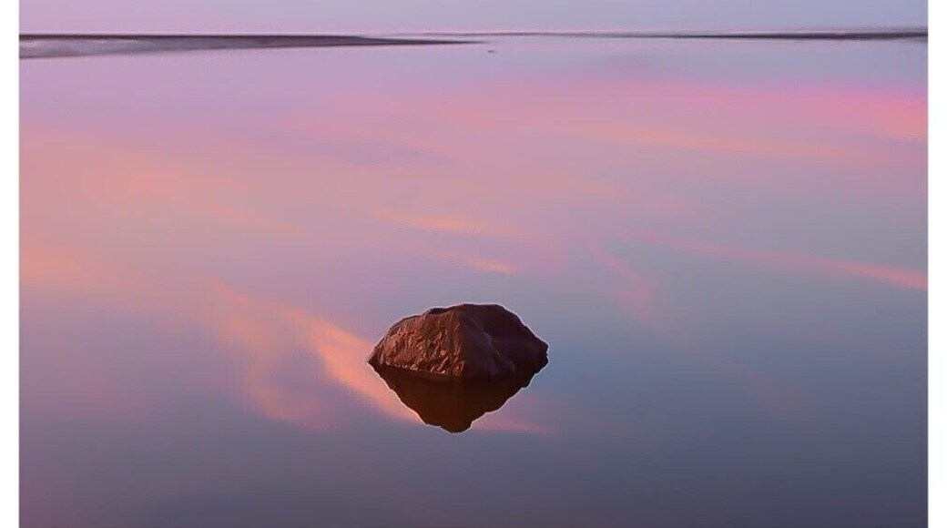 Kinmel bay beach at sunset when the ride is out