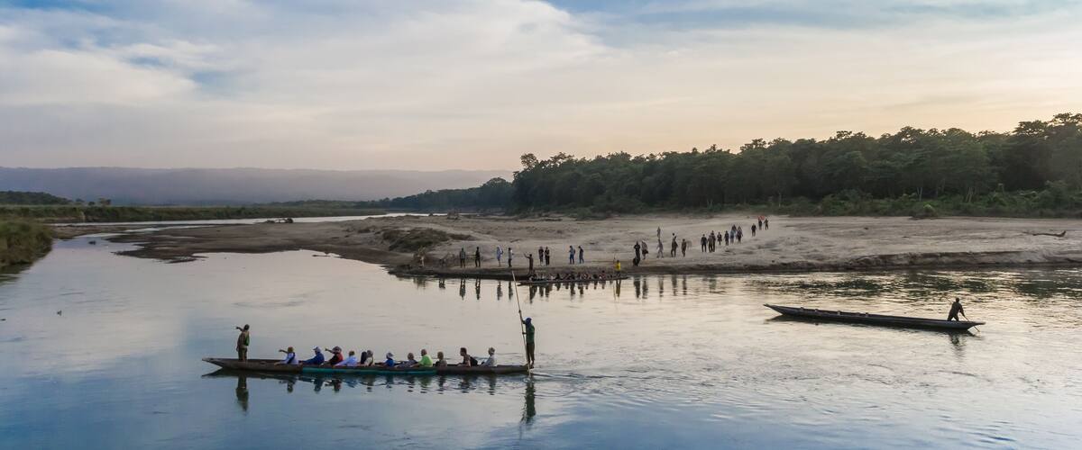 Tourists crossing the river to Chitwan National Park in Sauraha, Nepal