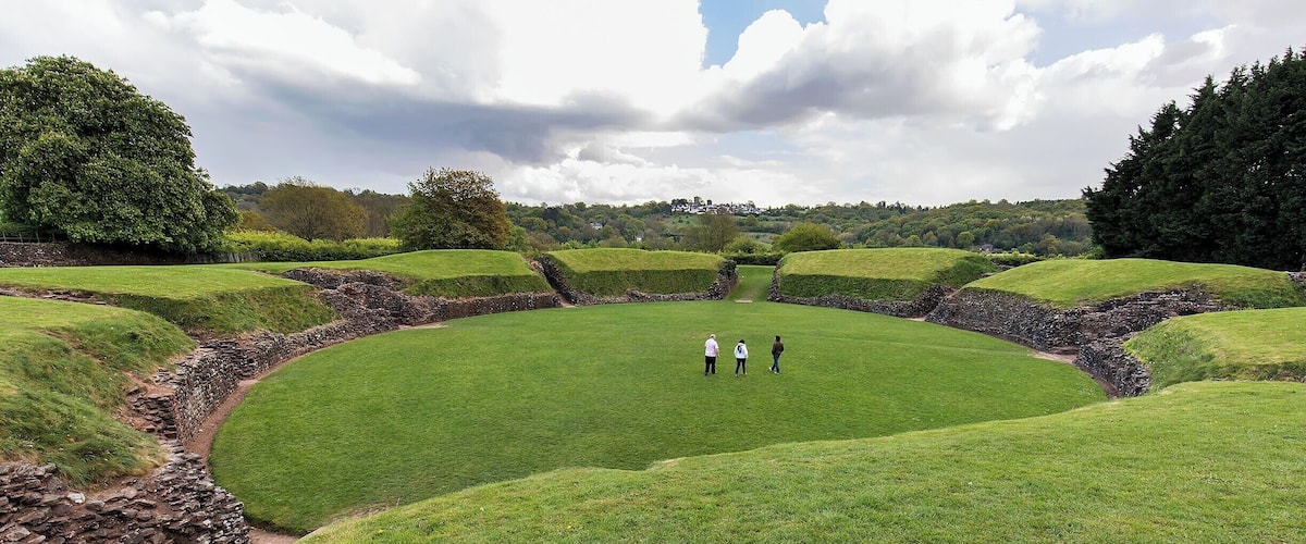 Well-preserved oval mound that once hosted gladiatorial combat and military processions. This amphitheater was built for the Roman forces at Isca around AD 90 and would have seated around 6000 spectators!