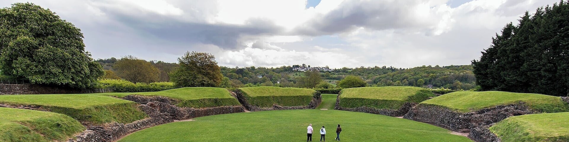 Well-preserved oval mound that once hosted gladiatorial combat and military processions. This amphitheater was built for the Roman forces at Isca around AD 90 and would have seated around 6000 spectators!