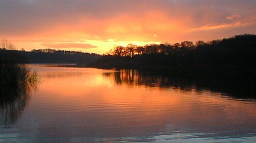 Sunrise across Chapel Bay on Ogston Reservoir at Brackenfield, Derbyshire, England