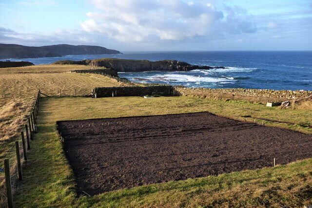 Kirtomy Bay Looking West with Kirtomy Bay in the middle ground and Farr Point in the background.