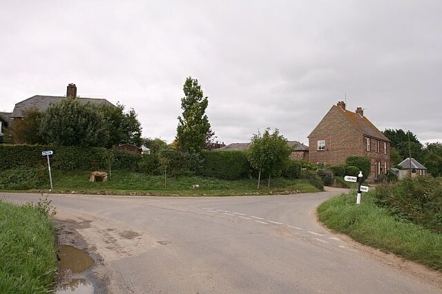Colworth Farm turning A junction between two minor roads, neither named, next to Colworth Farm.