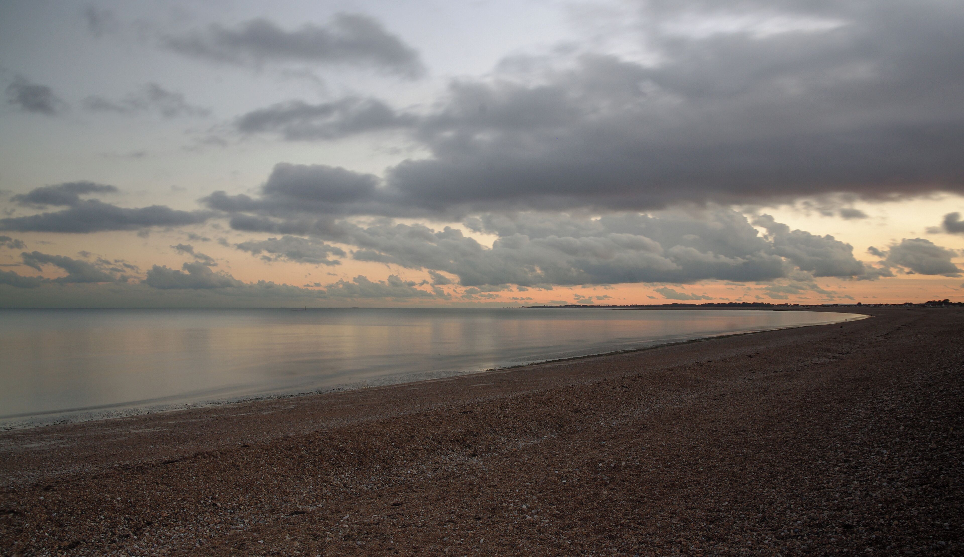 Long exposure photo of the sea at Bognor Regis near sunset. Taken using a neutral density filter.