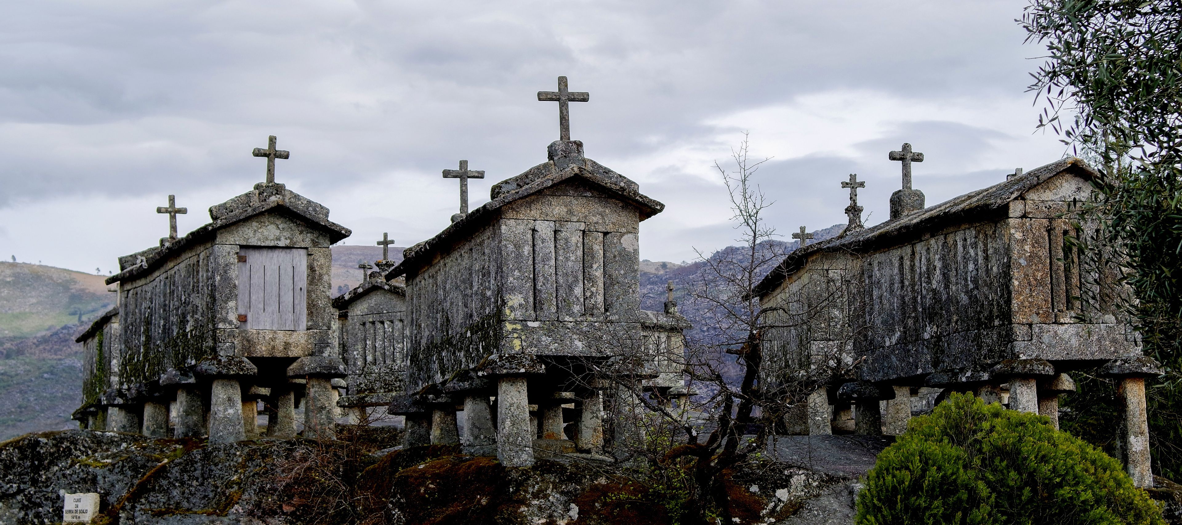Beautiful view of traditional old stone granaries in Soajo, Portugal under a gloomy sky