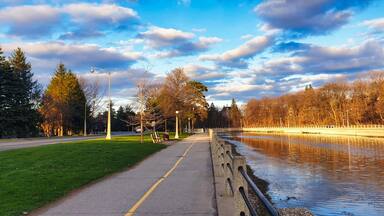 View of the Rideau Canal pathway on a warm spring afternoon in mid-April in Ottawa,Ontario,Canada