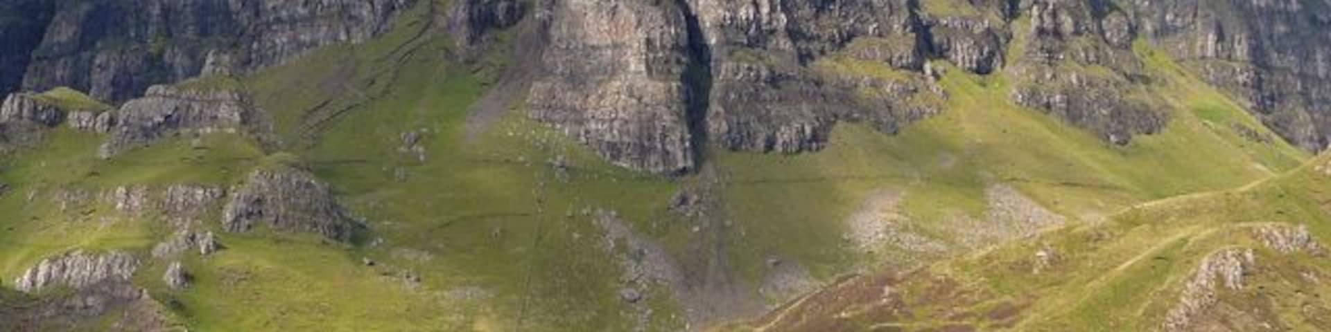Quiraing The front of the Quiraing seen from Dun Mor. The way in which the pinnacles, passages and secret places have been formed by landslip and shearing is evident from here.