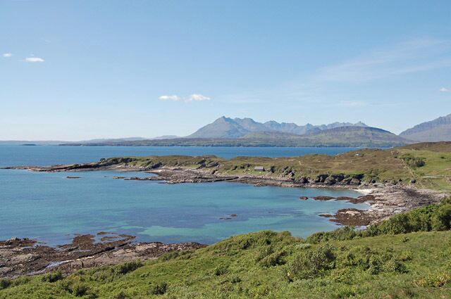 Tarskavaig Bay Looking a touch tropical on a warm May day. In the distance is the Cuillin.