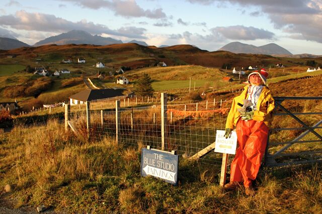 Tarskavaig: Halloween 2008 The setting sun lights up the Halloween decorations at the cross roads leading down to the crofting village of Tarskavaig