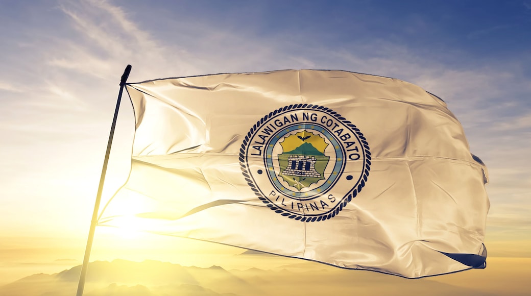 Cotabato province of Philippines flag waving on the top sunrise mist fog