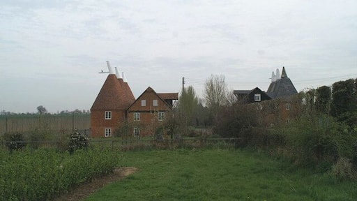 Styles in oast houses At Staplestreet, with the hop bines behind on the left
